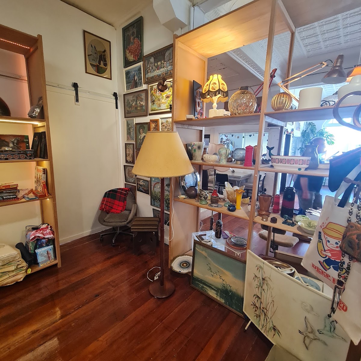 Vintage store shelves with lamps and ceramics